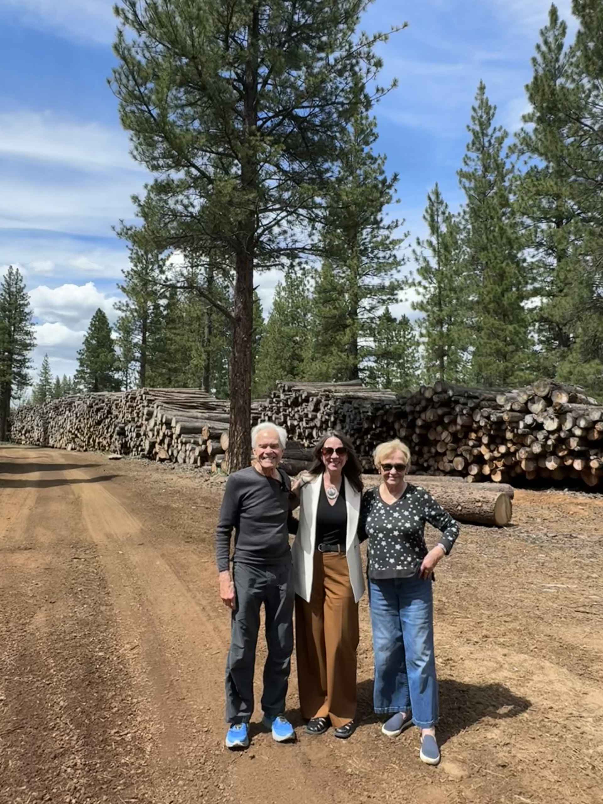 Bill Sr. and Christeny McGlashan with Stacy Caldwell, CEO at Alpenglow Timber, A Forest Futures Investment